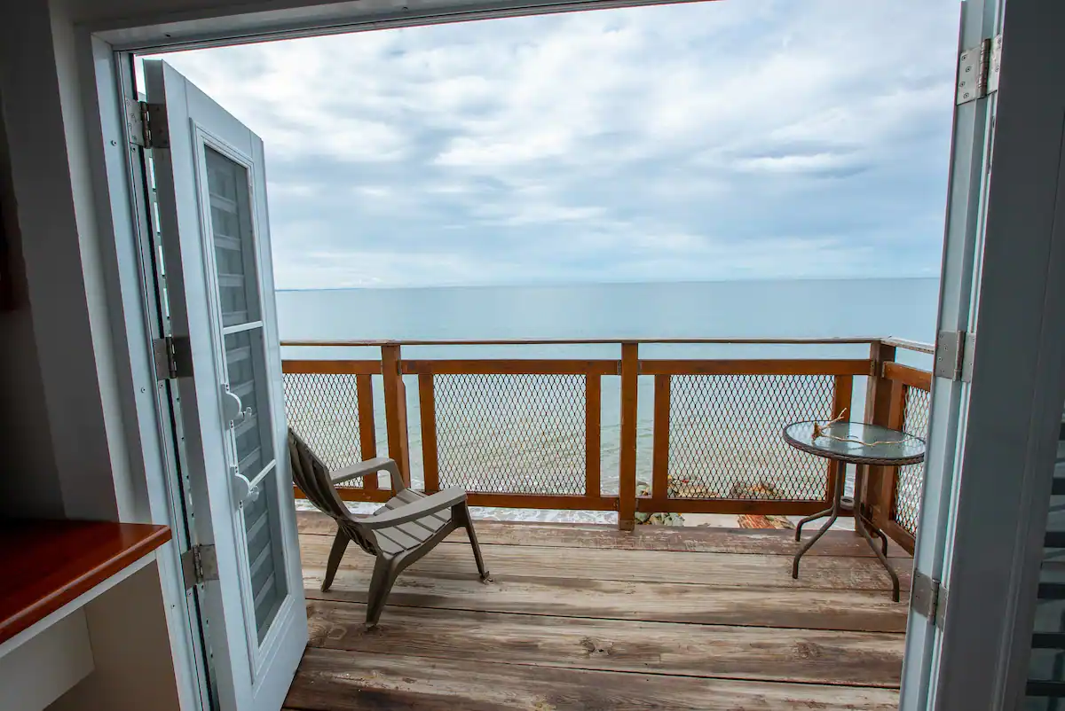 Urban Waves — beachfront apartment balcony with ocean view in Isla Verde