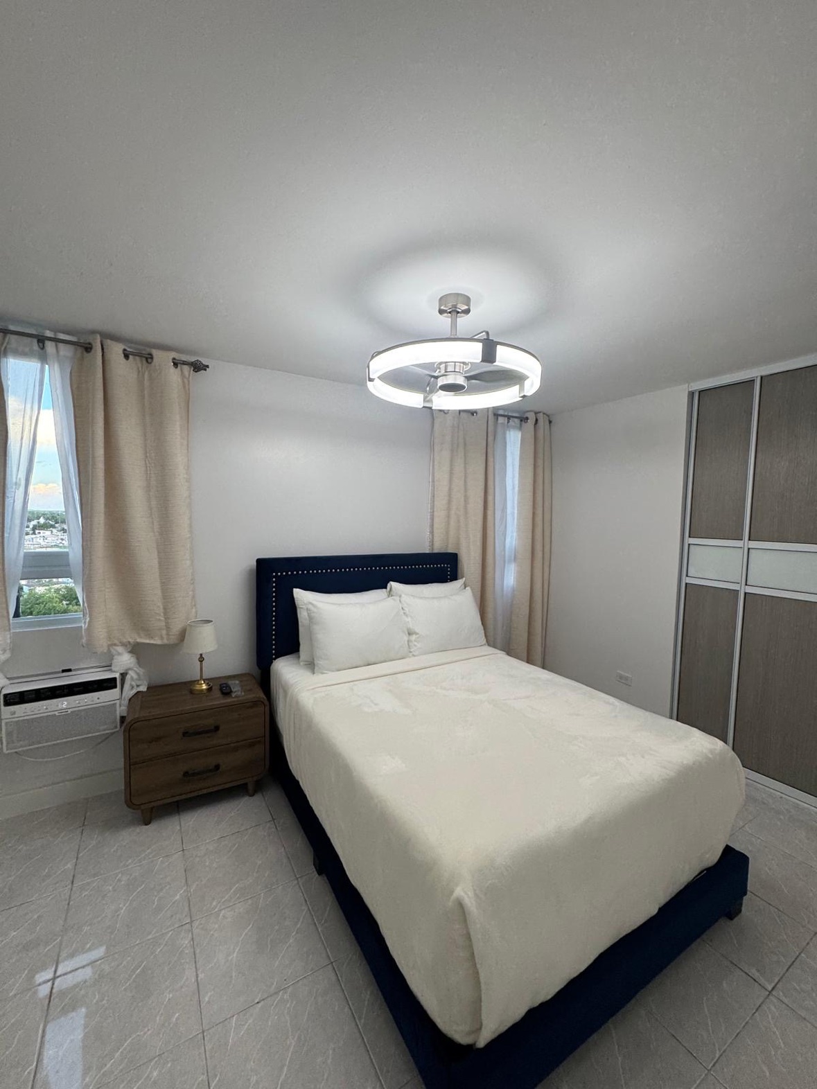 Furnished bedroom in a property managed by Prephome Services in Guaynabo